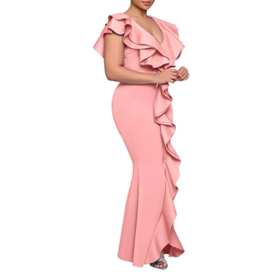 Detail of pink V-neck evening gown featuring elegant ruffled edges and mermaid style slit