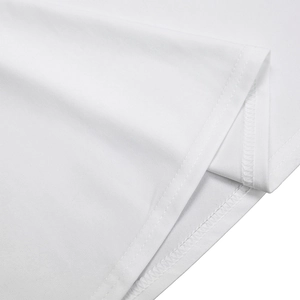 Detail shot of the double-needle flat seam on the hem of a white cotton fabric garment