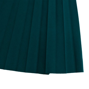 Detail shot of the dark green pleated fabric texture with uniform vertical folds