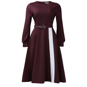 Detail of burgundy long sleeve dress featuring white vertical stripes and a matching belt