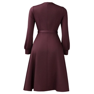 Back view of elegant burgundy long-sleeve A-line dress with hidden zipper and waist belt