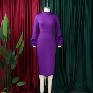 Detail of elegant purple midi dress featuring exquisite 3D floral accents on cuffs