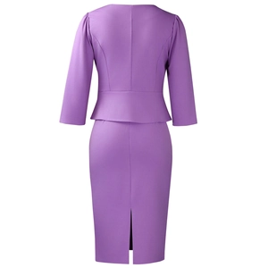 Back view of elegant purple peplum two-piece set with a slim fit pencil skirt