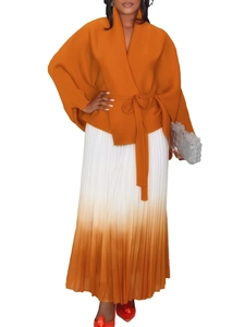 Completo elegante con top arancione annodato e gonna lunga a pieghe sfumata bianco-arancio