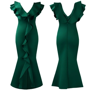 Detail of emerald green mermaid evening dress with V-neckline and tiered ruffles