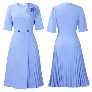 Detail of light blue V-neck dress featuring pleated skirt and floral decoration