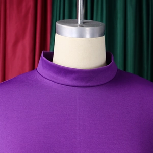 Detail of elegant purple high-neck slim fit dress featuring 3D floral accents on mannequin