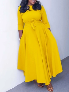 Elegant yellow A-line maxi dress with waist tie and three-quarter sleeves
