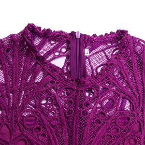 Close-up of dark purple lace dress neckline featuring intricate hollow crochet and invisible zipper