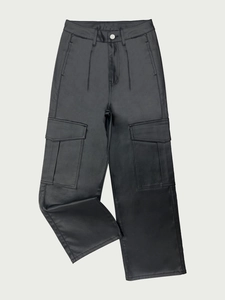Detail view of black faux leather cargo pants featuring high-waist and large flap pockets