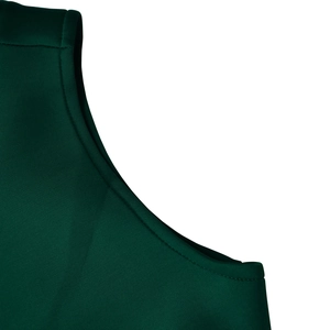 Detail of dark green sleeveless dress neckline featuring clean double-needle stitching