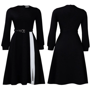 Detail of high waist A-line dress featuring white patchwork and silver buckle belt