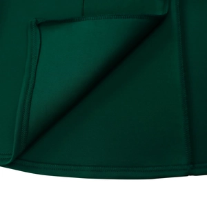 Detailed close-up of dark green fishtail hemline with professional reinforced stitching