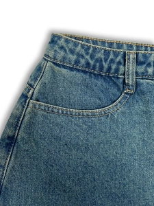 Blue denim skirt skort with classic five-pocket design and washed metal rivet details