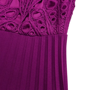 Detailed macro view of purple lace hollow out embroidery and pleated fabric stitching