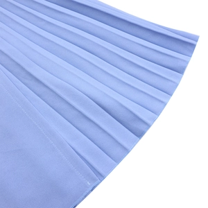 Detailed macro view of light blue pleated chiffon fabric with fine accordion fold edges