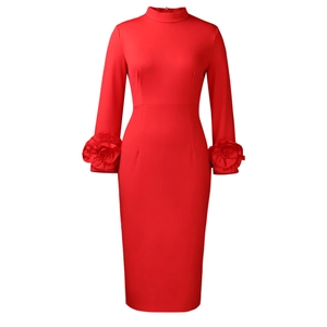 Detail of elegant red slim fit dress showing the unique 3D floral ruffles on long sleeves