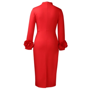 Detail of red mock neck dress featuring elegant 3D flower pleated cuffs and back slit