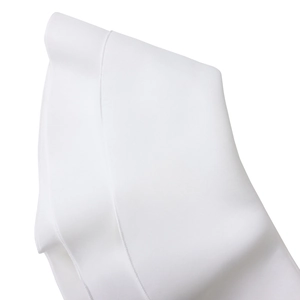 Close-up detail of smooth white fabric texture with fine stitching and premium seam finish