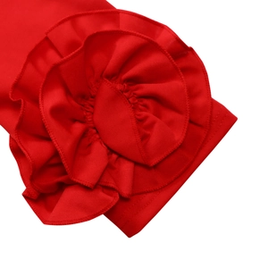 Detailed close-up of red ruffled floral embroidery and elegant fabric texture on the sleeve