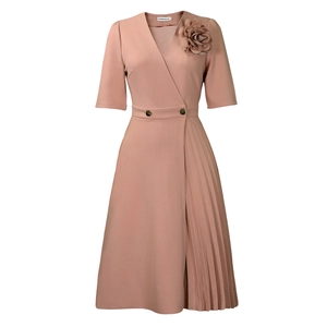 Detailed V-neck with gold buttons and 3D floral accent on the pink pleated dress