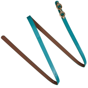 Detailed view of women's turquoise leather belt with elegant golden chain buckle