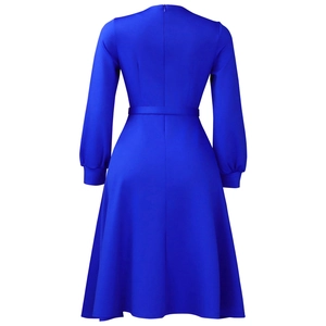 Rear view of royal blue A-line dress with long sleeves, waist belt and back zipper