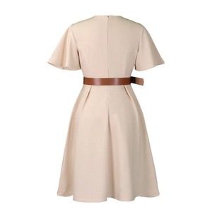 Detail view of the back of this elegant apricot dress featuring flutter sleeves and waist belt