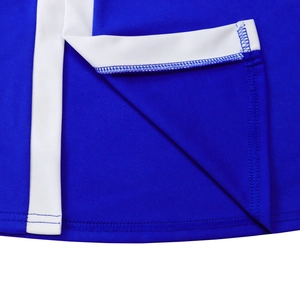 Detail of blue high-waist dress showing reinforced stitching and elastic polyester fabric