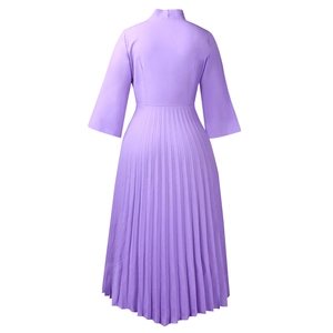 Detail of lavender midi dress featuring elegant pleated hem and back waist tailoring