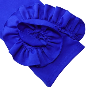 Detailed close-up of layered royal blue ruffle cuffs with pleated knit fabric texture