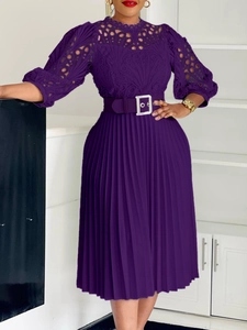Elegant dark purple pleated dress with lace embroidery and a belted waistline
