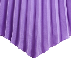 Detailed close-up of purple pleated fabric with fine hemmed edges on an elegant dress
