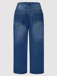 Back view of women's high-waisted wide-leg denim jeans in vintage washed dark blue