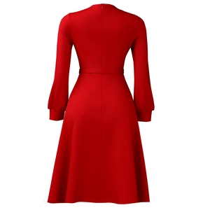 Detailed back view of a red long sleeve dress with waist belt and invisible zipper