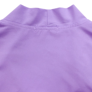 Detail of elegant purple dress showing mock neck collar and high-quality double stitching