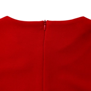 Detail of invisible back zipper closure on an elegant red high-waist dress