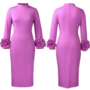 Detail of elegant burgundy dress featuring 3D floral cuffs and a high neckline