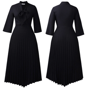 Front and back view of a black pleated midi dress with tie-neck and 3/4 sleeves