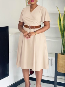 Elegant V-neck apricot dress with ruffle sleeves and waist belt for a chic office look