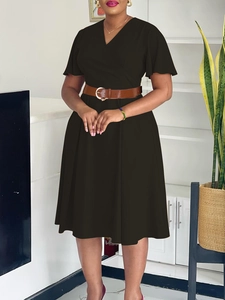 Elegant black V-neck wrap dress with bell sleeves and waist belt for women