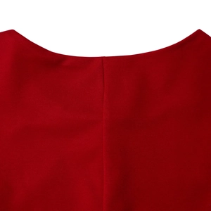 Close-up of elegant red ruffle neckline showing premium knit fabric texture and stitching