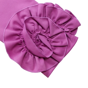 Detailed macro shot of purple knit dress featuring layered ruffles and fine stitching