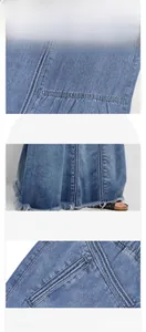 Détail de jupe en jean bleue montrant coutures, ourlet effiloché et structure de poche