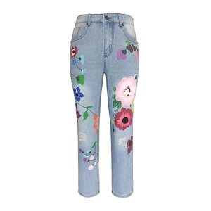 Women's light blue high-waist straight jeans with colorful floral print and distressed detail