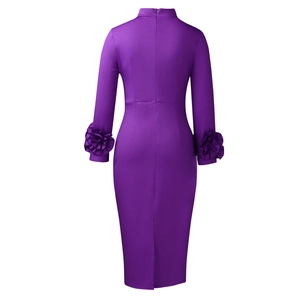 Detail view of the elegant purple dress featuring 3D floral accents on the long sleeves