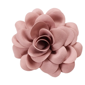 Detailed close-up of a dusty pink fabric 3D floral applique with layered petals