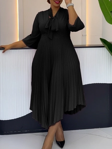 Elegant black pleated midi dress with pussy-bow neck and three-quarter sleeves