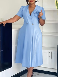 Elegant light blue V-neck dress with 3D floral accent and pleated skirt design