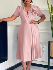 Elegant pink V-neck short sleeve midi dress with 3D floral accent and pleated skirt detail